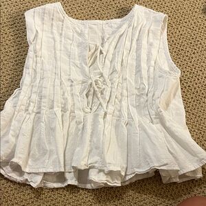 White Sleeveless Top w/ ties down the middle